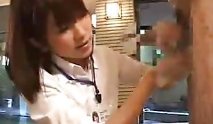 Shy Japanese employee gives out handjobs at hot spring